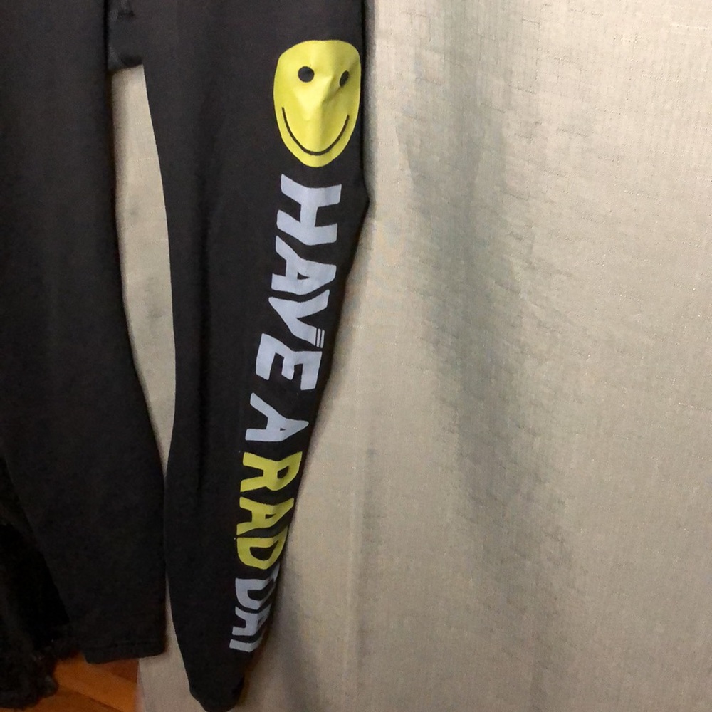 Aviator Nation Black Leggings with Yellow Smiley and White/Yellow Side Script - Picture 8 of 8